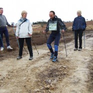 Image of Nordic Walkers learning downhill